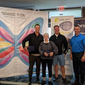 Équipe gagnante en présence de Jeff Hill de BMO et Sylvain Brisebois de BMO